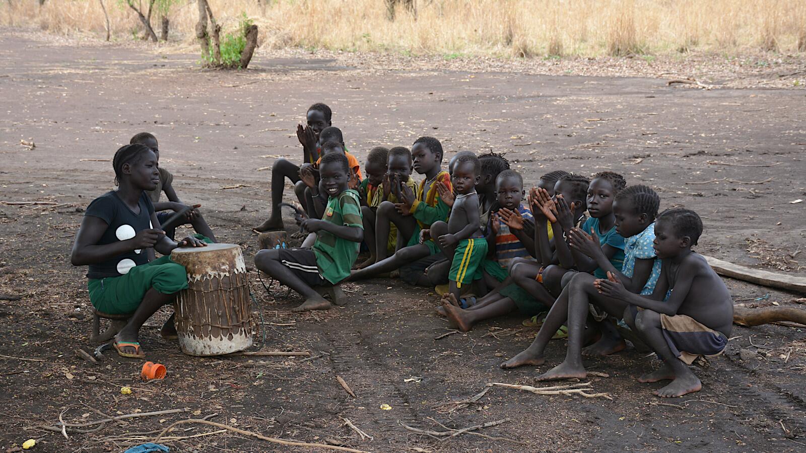 Opo children singing.