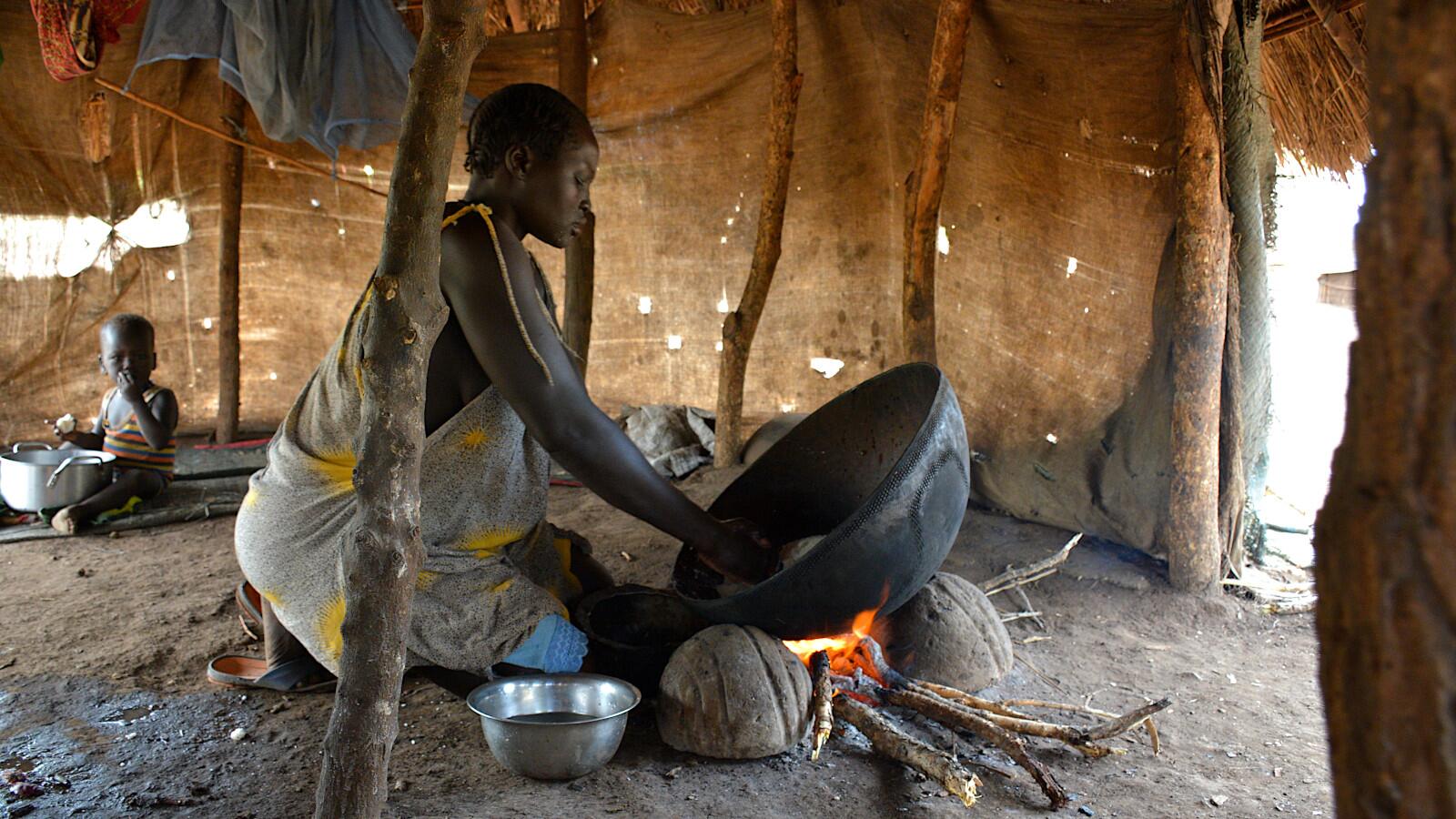 Opo woman cooking mapo.