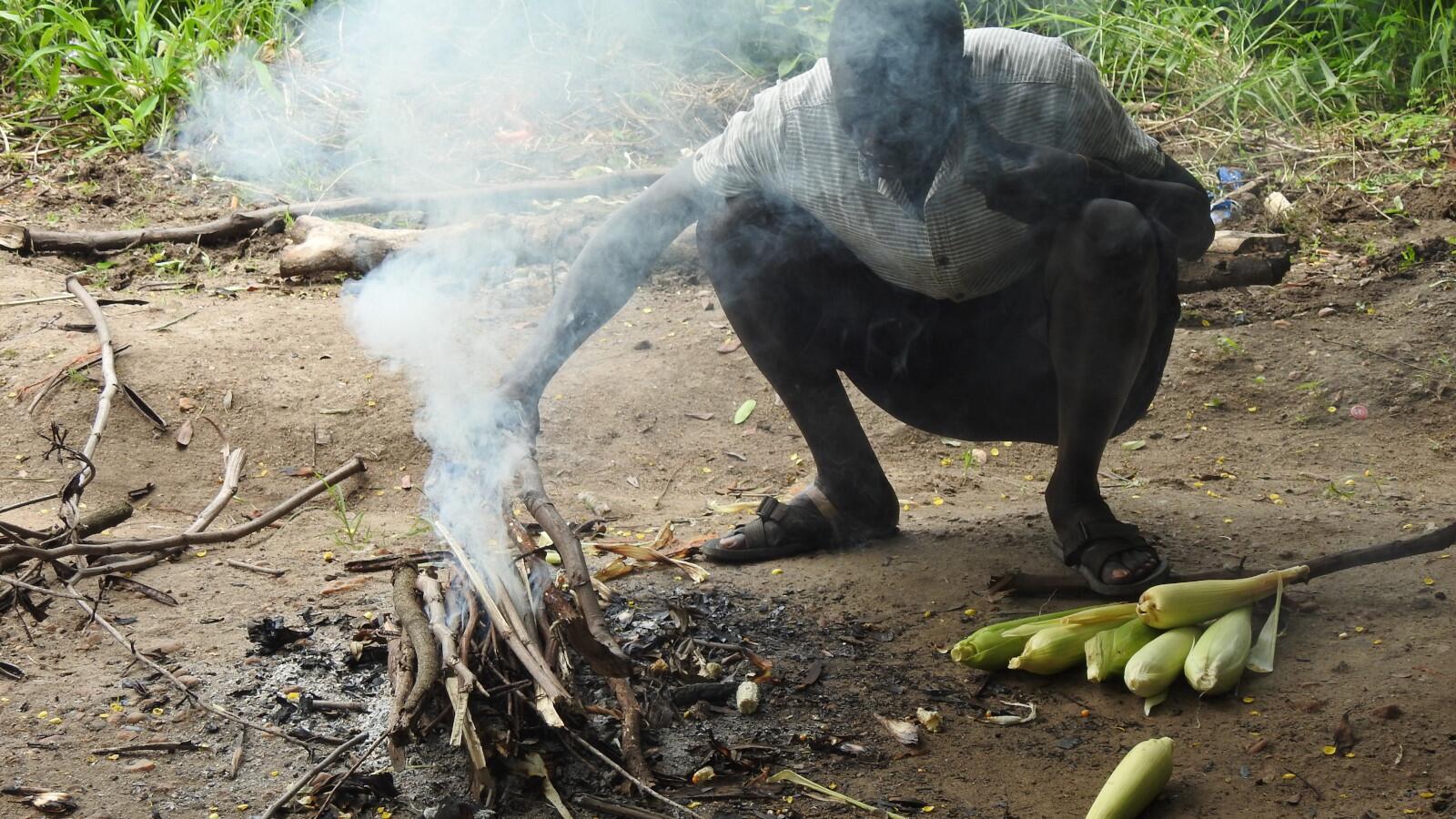 Roasting corn.